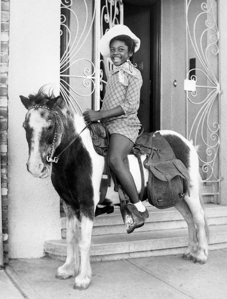 annees 50 aux etats-unis fille noire sur poney
